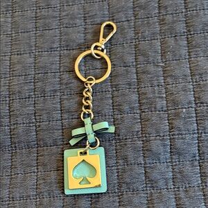kate spade mint green bow & spade cutout keychain CB with gold-tone hardware